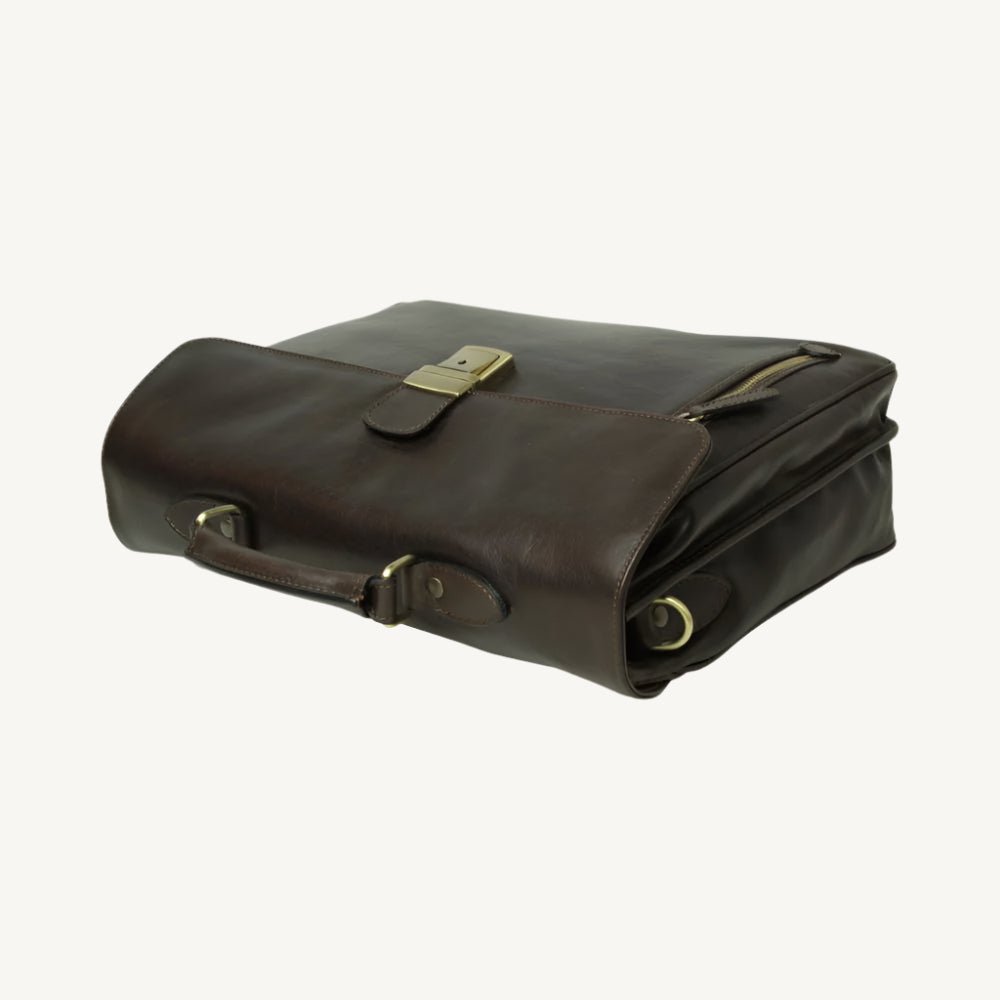 Full grain leather briefcase with clasp flap, laptop compartment, synthetic lining, phone pocket, pen holder, and removable leather shoulder strap.
