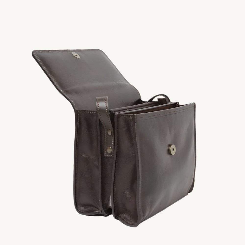 "Full-grain calfskin leather shoulder bag with three compartments, zippered rear pocket, and adjustable shoulder strap"