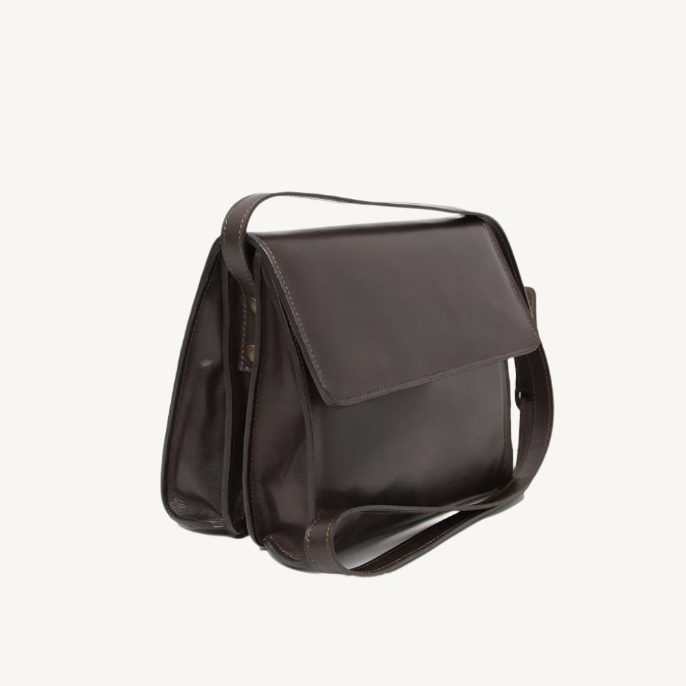 "Full-grain calfskin leather shoulder bag with three compartments, zippered rear pocket, and adjustable shoulder strap"