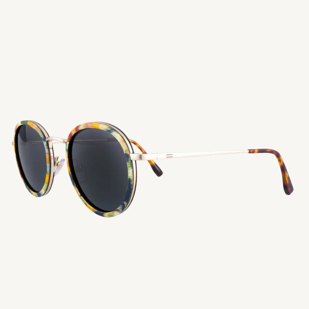 Dora metal and wood sunglasses — stylish, lightweight, and unique, featuring a blend of sleek metal frames and natural wood accents. Ideal for a modern, chic look with a touch of nature.