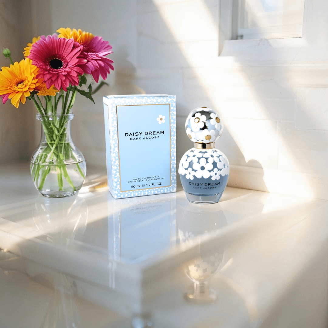 Marc Jacobs Daisy Dream perfume bottle — a light and airy fruity-floral fragrance capturing the youthful, whimsical spirit of the Daisy collection.