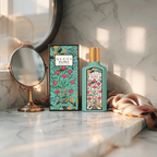 "Gucci Flora Gorgeous Jasmine Eau de Parfum 3.3 oz – luxurious turquoise bottle with floral details, evoking elegance and fresh jasmine blooms."