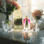 "Mancera Roses Greedy Eau de Parfum 4 oz – a luxurious glass bottle with a gold-toned cap, containing a pink-hued fragrance, reflecting elegance and sophistication."