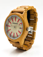 Wooden watch with red accents on a white background