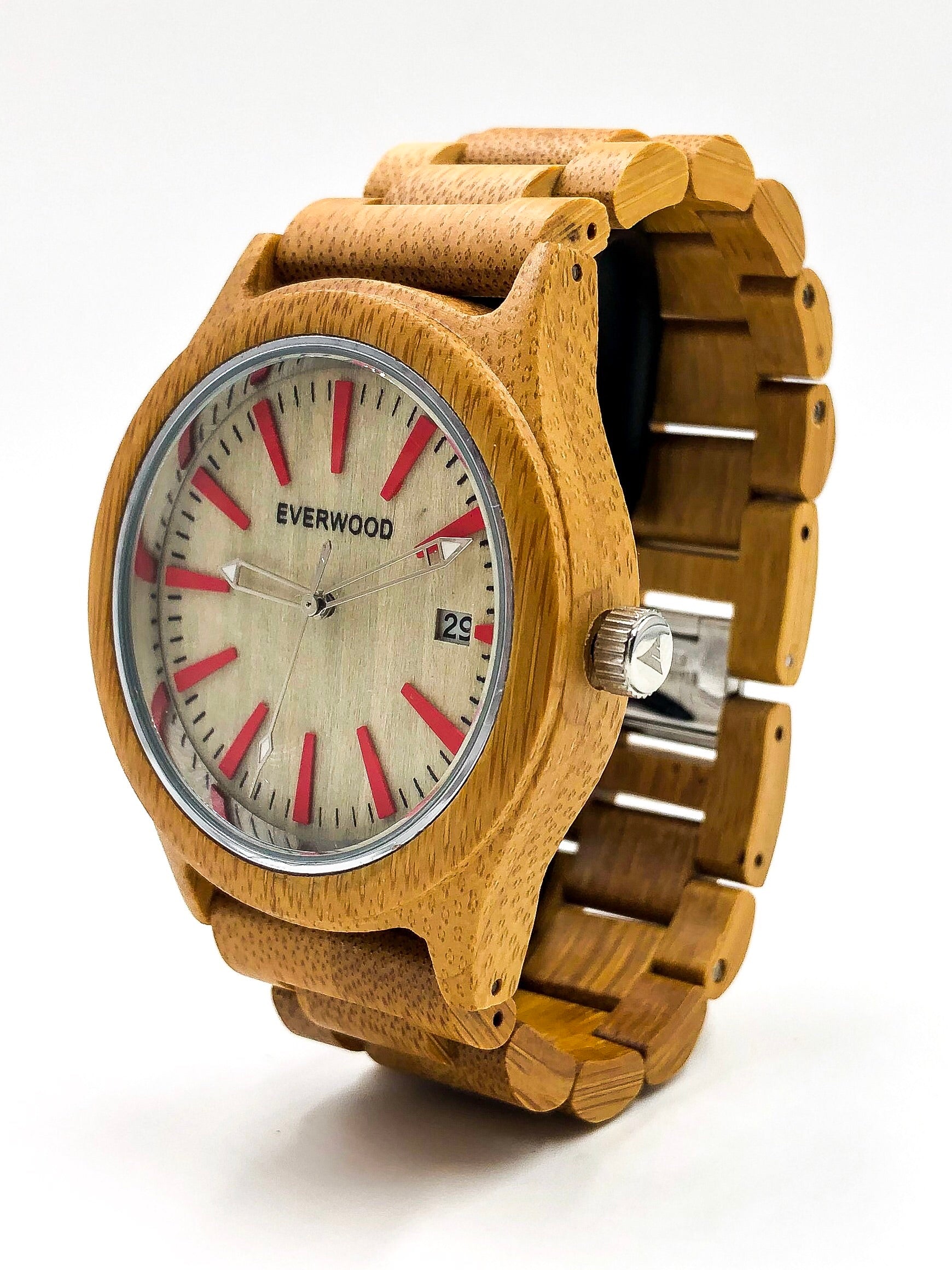 Wooden watch with red accents on a white background