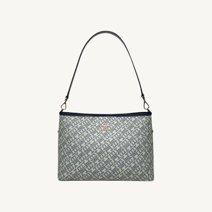 Tommy Hilfiger Women's Bag, featuring a chic and modern design crafted from premium materials, perfect for everyday use and adding a sophisticated touch to any outfit.