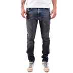 Diesel blue jeans with a raw denim finish, styled flat to show rugged texture and authentic edge — bold design with confident attitude.