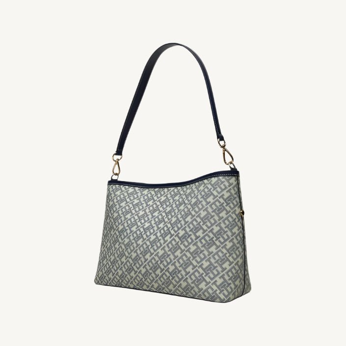 Tommy Hilfiger Women's Bag, featuring a chic and modern design crafted from premium materials, perfect for everyday use and adding a sophisticated touch to any outfit.