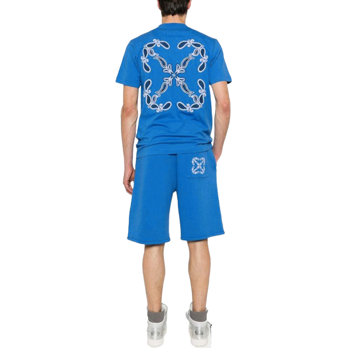 Off-White light blue t-shirt displayed flat, featuring minimalist branding and relaxed fit — an understated icon of streetwear style.