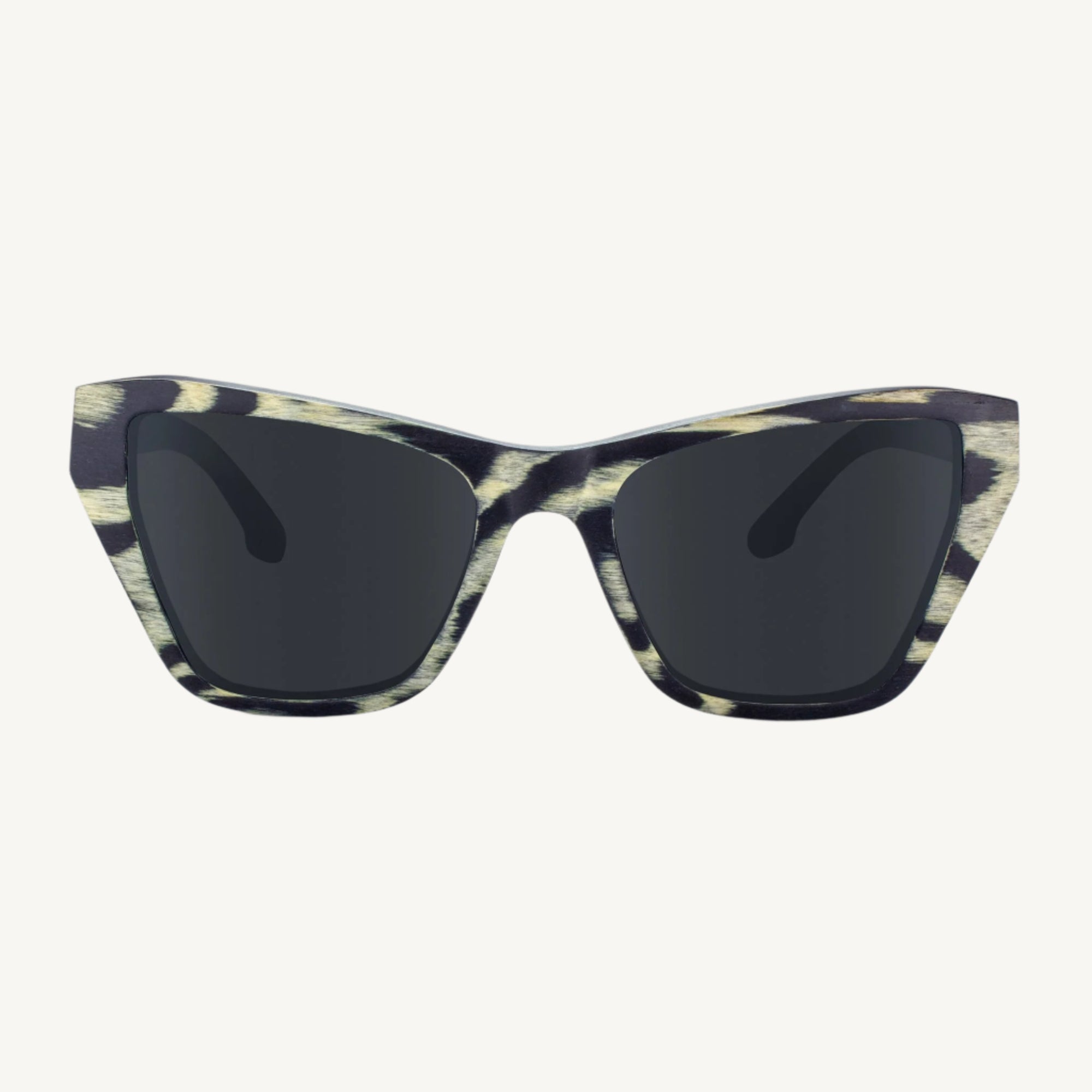 Noma eyeglasses — bold and stylish with an oversized cat-eye shape, beveled face front, and tall brow. Designed to make a statement and stand out from the crowd.
