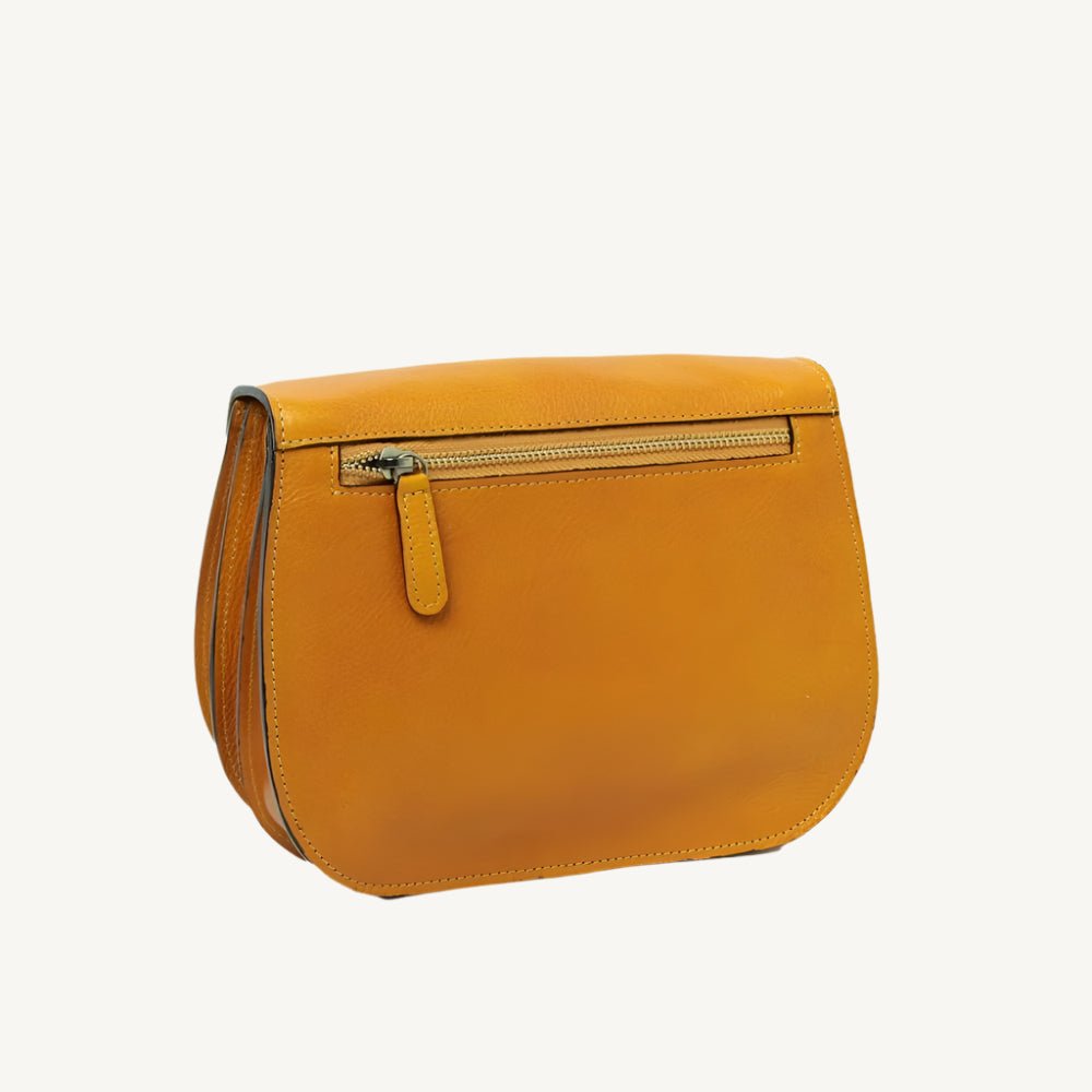 Elegant full-grain calfskin leather shoulder bag with zippered front and back pockets, three compartments, and adjustable strap.