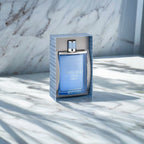 "Jimmy Choo Man Aqua 6.7 oz Eau de Toilette Spray – a sleek, ocean-blue bottle with a silver-toned cap, exuding freshness and modern masculinity."