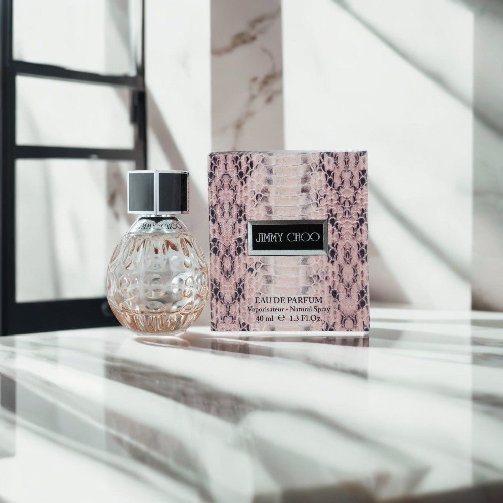 "Jimmy Choo 1.3 oz Eau de Parfum spray for women – elegant and feminine fragrance in a compact designer bottle."