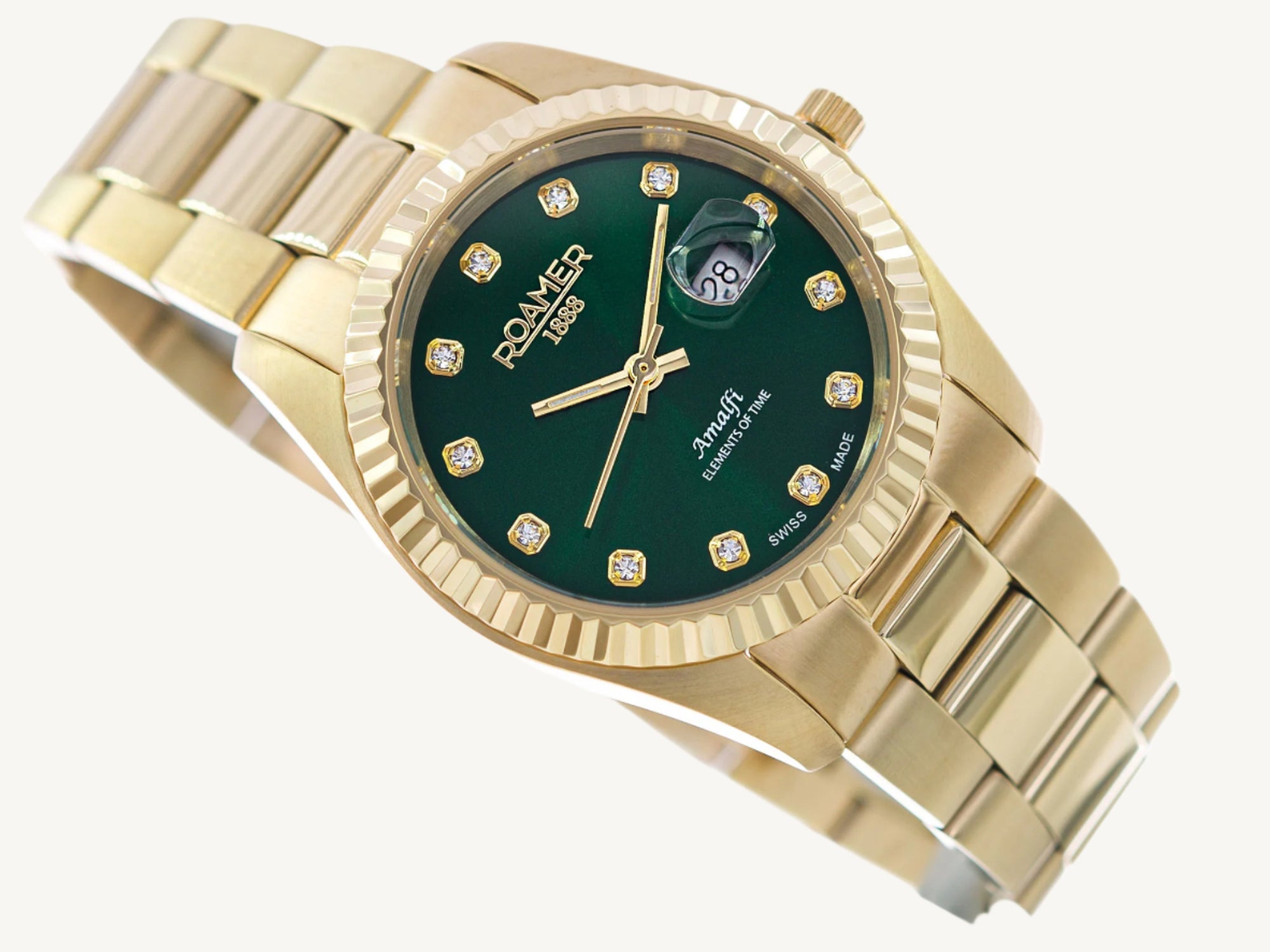 Elegant Roamer Amalfi ladies watch with gold-tone stainless steel strap, green dial set with stones, and sapphire glass.