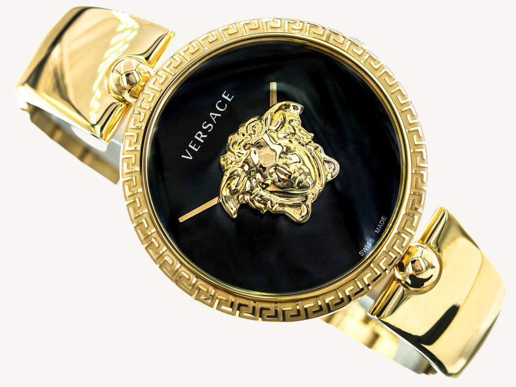 Versace VECO03122 Palazzo Empire ladies watch with 3D Medusa head on the dial, black case and strap, and bold gold-tone accents.