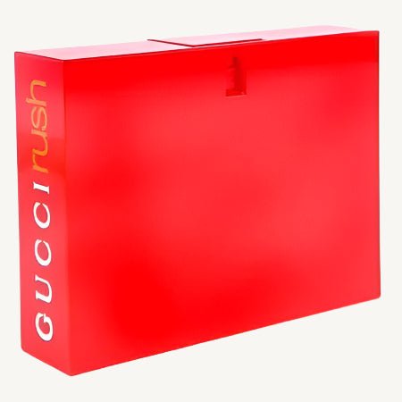 "Gucci Rush 2.5 oz Eau de Toilette Spray for Women – bold red rectangular bottle with minimalist design, reflecting the vibrant and sensual fragrance within."