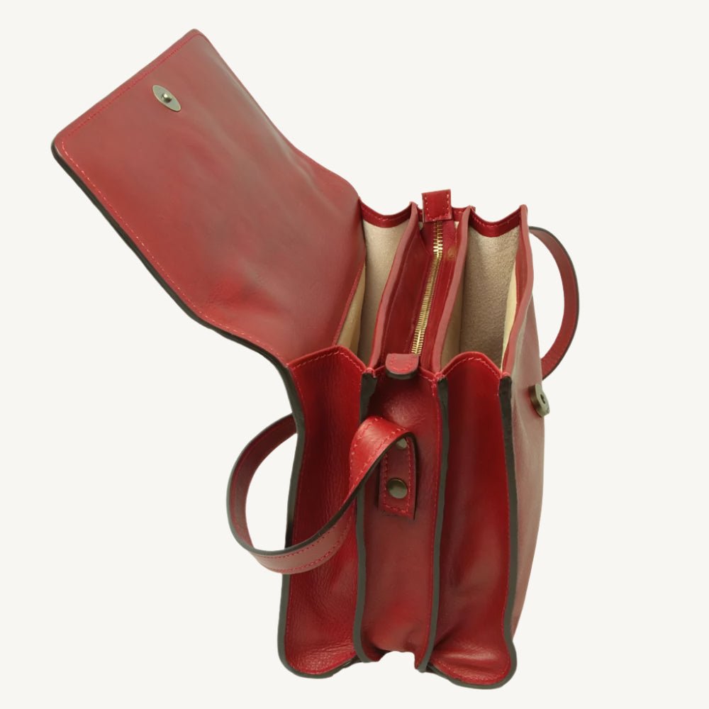 "Full-grain calfskin leather shoulder bag with three compartments, zip closure, rear zip pocket, and adjustable strap"