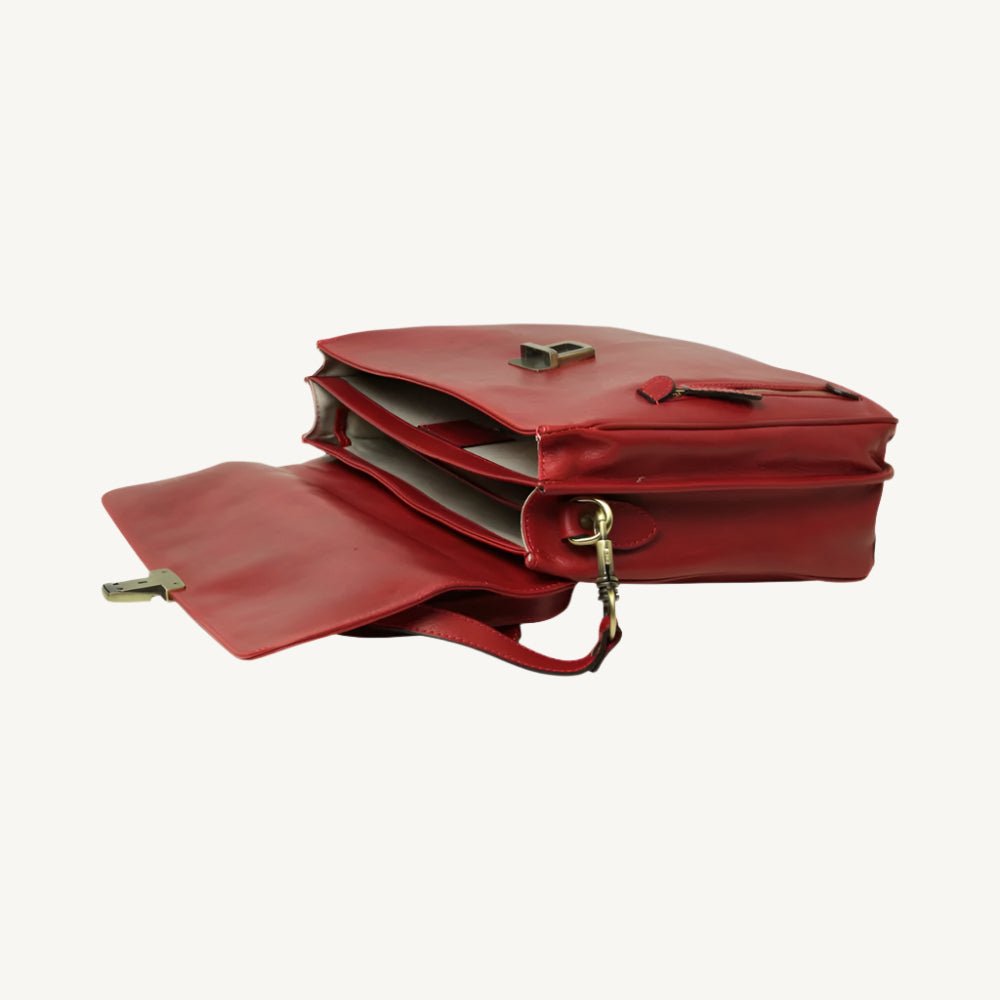 "Stylish leather messenger bag featuring synthetic lining, a laptop compartment, phone pocket, pen holders, external zip pocket, clasp flap closure, and adjustable removable shoulder strap with pad."