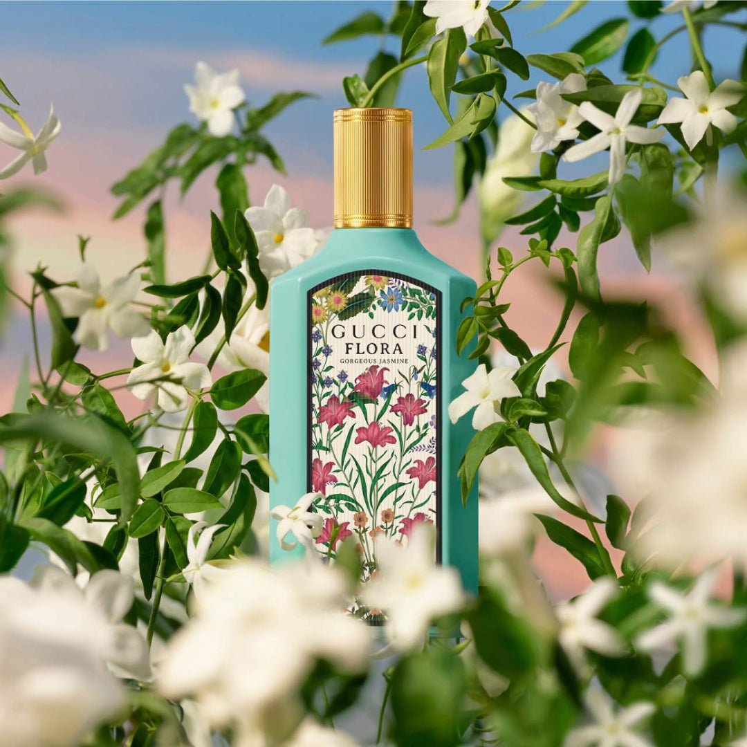 "Gucci Flora Gorgeous Jasmine Eau de Parfum 3.3 oz – luxurious turquoise bottle with floral details, evoking elegance and fresh jasmine blooms."