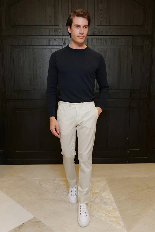 Ivory cotton chino trousers — lightweight, breathable, and elegant, perfect for spring and summer. A refined choice for casual and smart-casual wear.