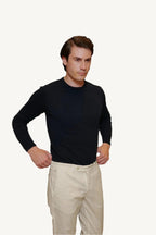 Ivory cotton chino trousers — lightweight, breathable, and elegant, perfect for spring and summer. A refined choice for casual and smart-casual wear.