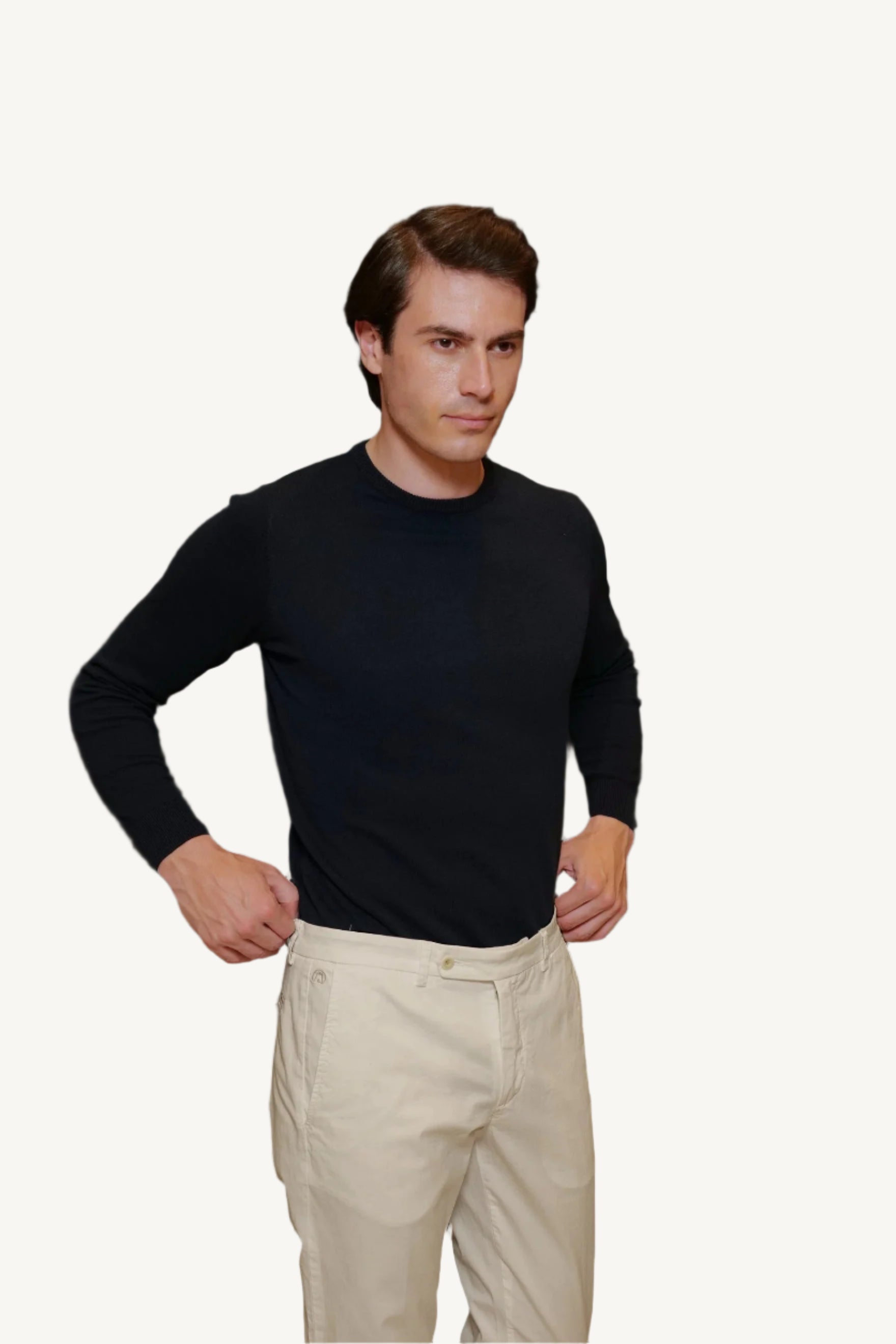 Ivory cotton chino trousers — lightweight, breathable, and elegant, perfect for spring and summer. A refined choice for casual and smart-casual wear.
