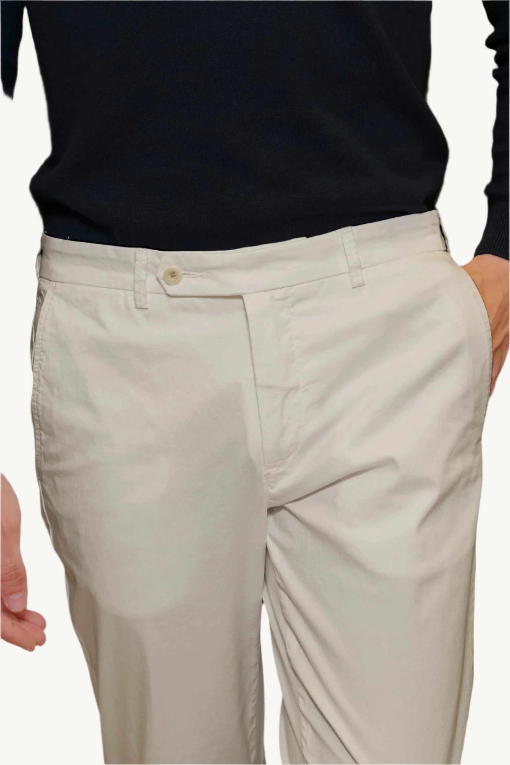 Ivory cotton chino trousers — lightweight, breathable, and elegant, perfect for spring and summer. A refined choice for casual and smart-casual wear.