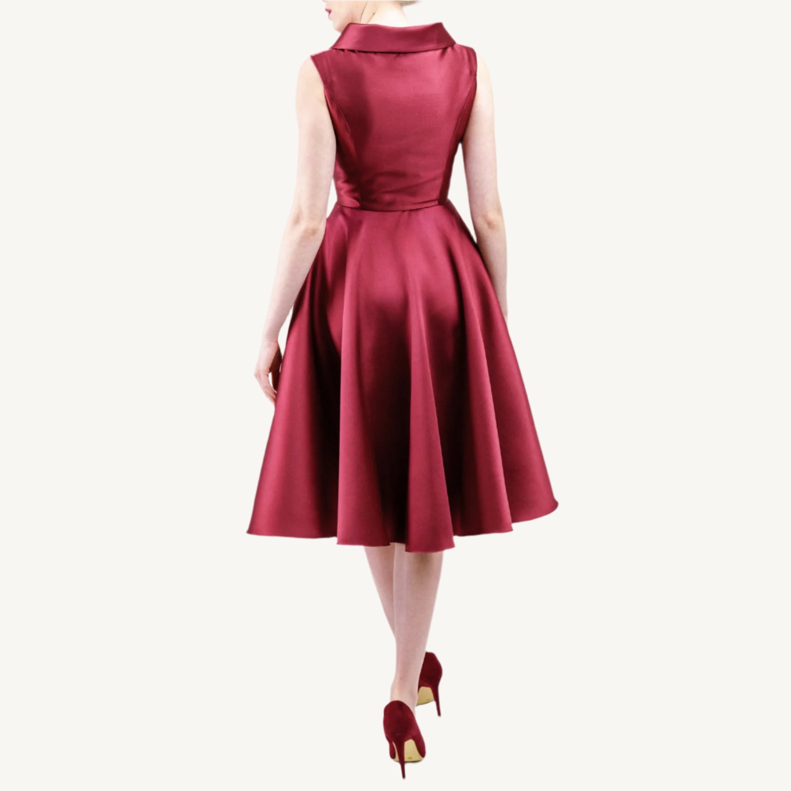 Versatile vintage-inspired dress crafted from pearlescent mikado — lightweight and voluminous with a fitted top, sculpted collar, and a hidden zipper for nursing mothers. Suitable for both daytime and evening events.