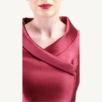 Versatile vintage-inspired dress crafted from pearlescent mikado — lightweight and voluminous with a fitted top, sculpted collar, and a hidden zipper for nursing mothers. Suitable for both daytime and evening events.