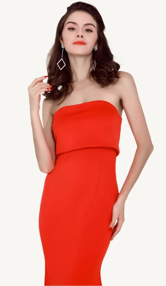 Elegant woman wearing the Evelyn Belluci Red Strapless Gown, featuring a sculpted neckline and flowing maxi silhouette, perfect for glamorous evening occasions.