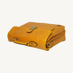 "Elegant full grain leather briefcase in yellow ocher, designed for work and business with premium craftsmanship and timeless style."